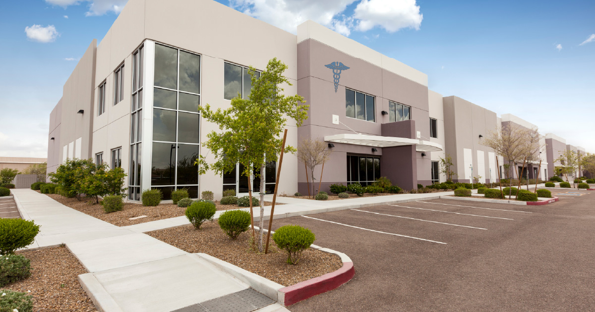 A medical building with a clean parking lot and façade